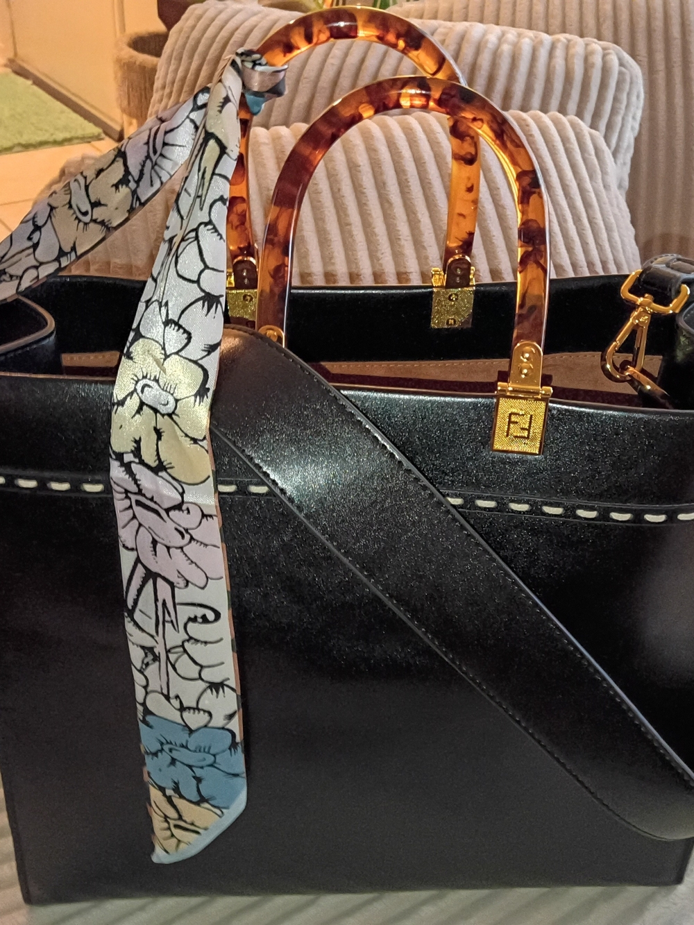Black Leather Tote with Tortoiseshell Handles and Floral Scarf